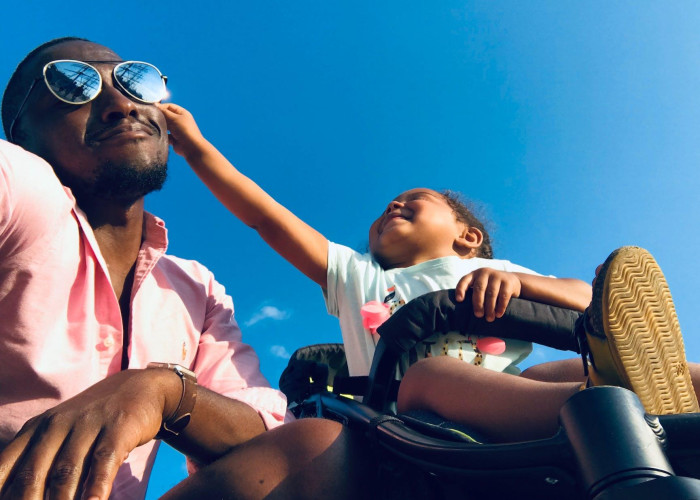 a child touching father s face